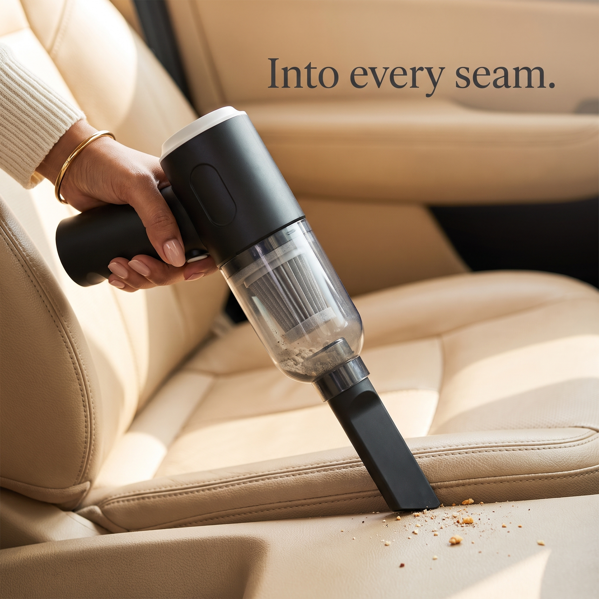 Crevice nozzle cleaning a car seat gap